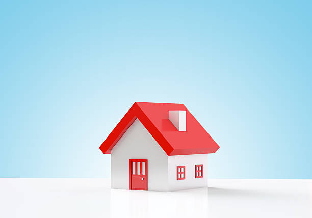 House on blue background House on blue background with copy space model house stock pictures, royalty-free photos & images
