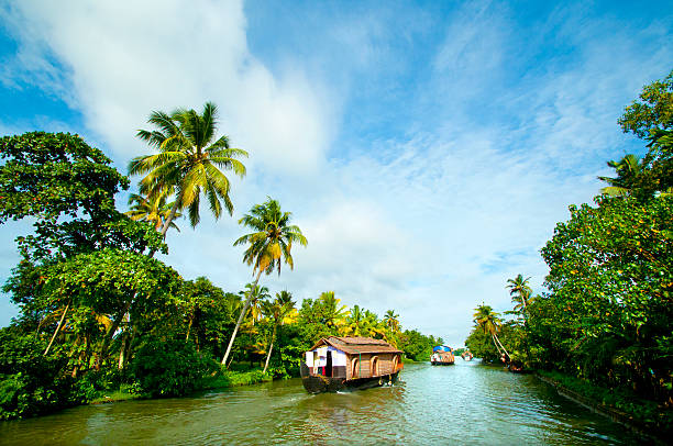 Houseboat houseboat cruise through the backwaters, kerala, india kerala stock pictures, royalty-free photos & images