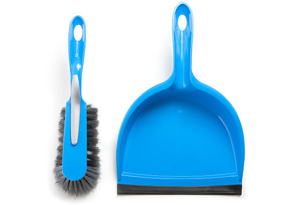 Household cleaning brush and dustpan stock photo