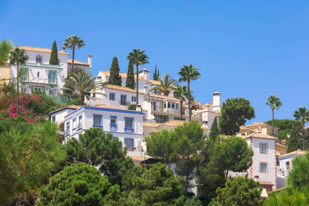 Houses in Costa del Sol Houses along a hillside outside Marbella on the sunny coast, Costa del Sol, in Spain. marbella stock pictures, royalty-free photos & images
