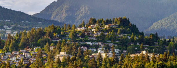 houses on a hill at sunset, West Vancouver, BC, Canada houses on a hill at sunset, West Vancouver, BC, Canada west vancouver stock pictures, royalty-free photos & images