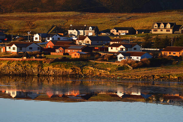 Houses on the shore of Shetland Islands stock photo