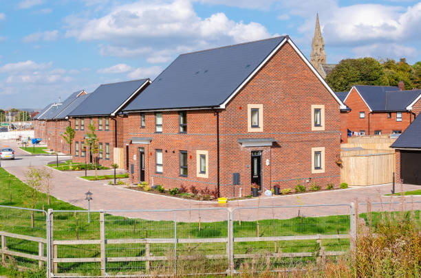 Housing development in England and blue sky stock photo