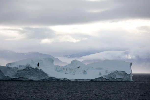 Huge iceberg in Ilulissat Icefjord in Disko Bay, Greenland, Denmark stock photo