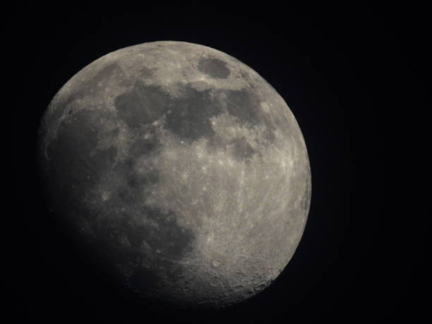 huge moon almost full - planet zoom out imagens e fotografias de stock