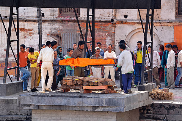 Human cremation along the holy Bagmati River at Pashupatinath, N stock photo