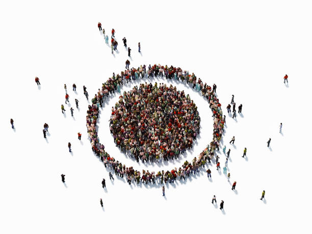 Human Crowd Forming A Target Symbol: Target Market Concept Human crowd forming a big target symbol on white background. Horizontal  composition with copy space. Clipping path is included. Target market concept. target market stock pictures, royalty-free photos & images