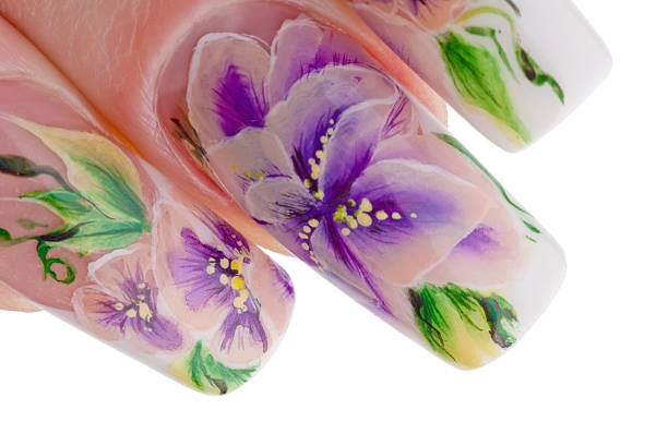 Human fingers with beautiful spring manicure stock photo
