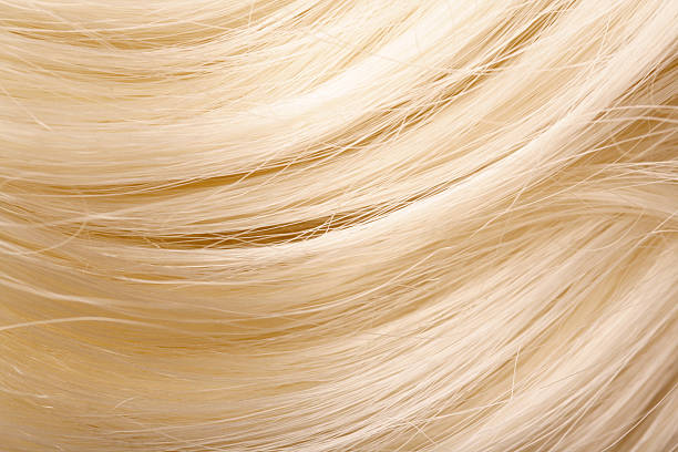 human hair - blond haar stockfoto's en -beelden