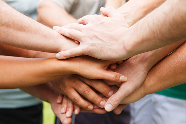 Human hands showing unity stock photo