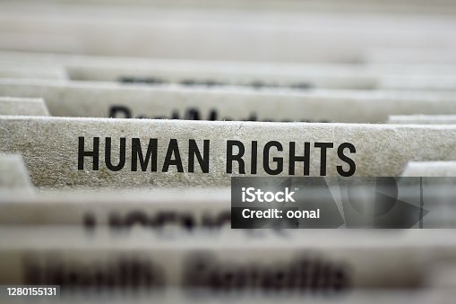 istock Human Rights label on file folder tab 1280155131