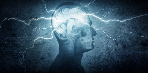 Human silhouette with lightning from the brain. stock photo