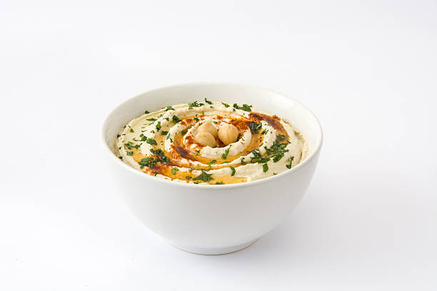 Hummus on white background stock photo