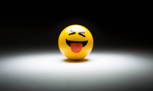 humorous smile emoji emoticon smiling funny emoji emoticon stick out tongue emoji stock pictures, royalty-free photos & images