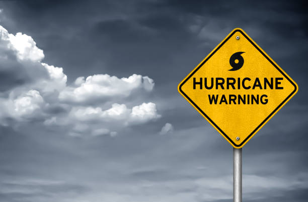 Hurricane warning road sign stock photo