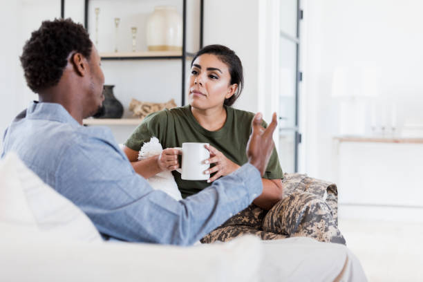 Husband and wife having serious conversation stock photo