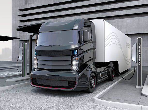 Hybrid electric truck being charging at charging station Hybrid electric truck being charging at charging station. 3D rendering image. electricity stock pictures, royalty-free photos & images