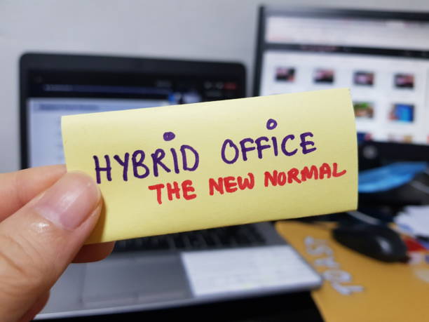 Hybrid Office Workplace. The new normal during pandemic stock photo