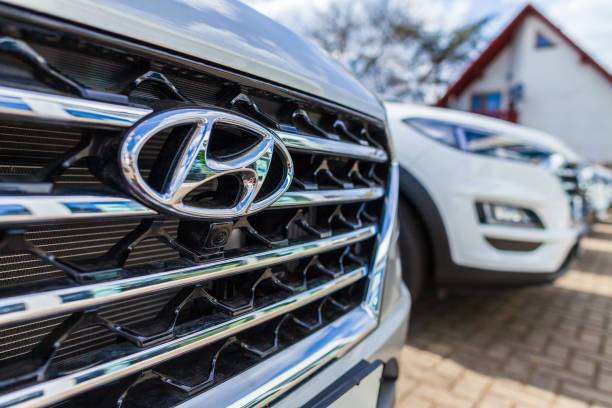 Hyundai logo on a Hyundai car at a car dealer Nuremberg / Germany - April 7, 2019: Hyundai logo on a Hyundai car at a car dealer. The Hyundai Motor Company is a South Korean multinational automotive manufacturer headquartered in Seoul. brand name stock pictures, royalty-free photos & images