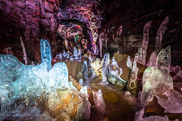 Raufarholshellir - May 04, 2018: Ice crystals inside the Raufarholshellir lava tunnels, Iceland stock photo