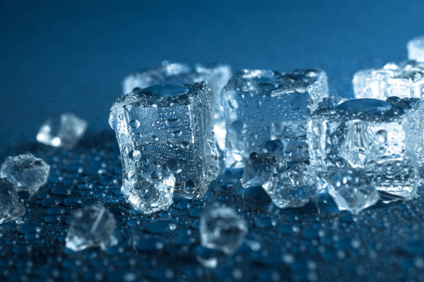 Ice cubes with drops stock photo