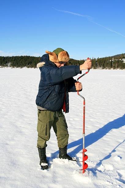 Ice fishing stock photo