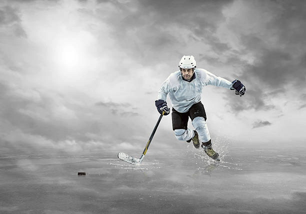 Ice hockey player on the ice in mountains  hockey goalie stick stock pictures, royalty-free photos & images