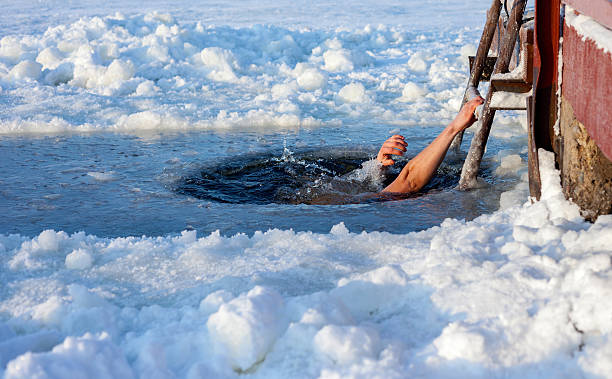 ice hole swimming - ice bath bildbanksfoton och bilder
