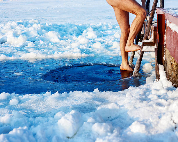 ice hole swimming - ice swimming stockfoto's en -beelden
