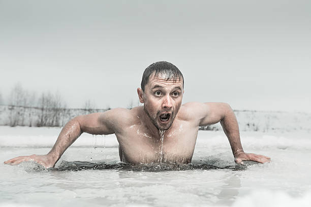 ice hole swimming - ice swimming stockfoto's en -beelden