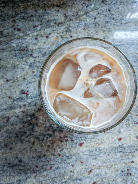 Iced lattes on granite countertop stock photo