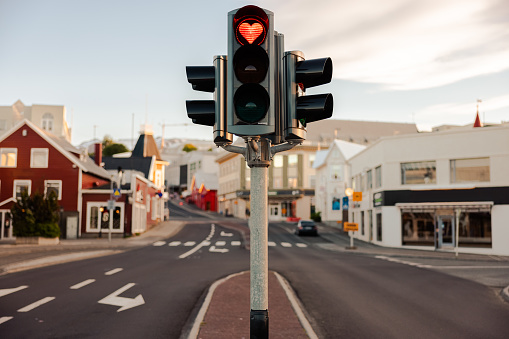 Iceland Akureyri City Love Traffic Light at Downtown City Road Intersection with a Heart Shaped Red Light. Heart Shaped Love Symbol in Red Stop Light inside a typical City Traffic Light in the City of Akureyri, Northern Iceland. Akureyri, Iceland, Northern Europe.