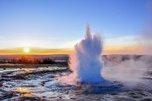 Iceland - Geyser during the sunrise Geysir sometimes known as The Great Geysir, is a geyser in southwestern Iceland. iceland stock pictures, royalty-free photos & images