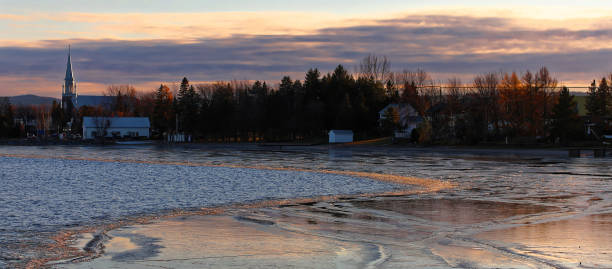Icy sunset on Roberval from Lac Saint Jean stock photo