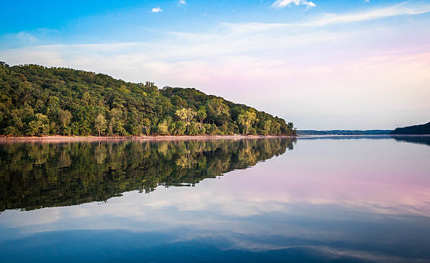 Idyllic crystal clear, mirror reflecting lake in Wisconsin stock photo