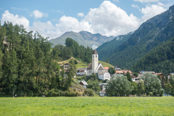 Idyllic summer views of the old alpine village Graun stock photo