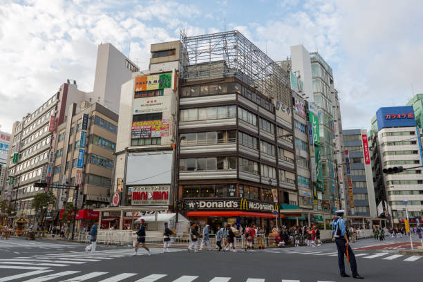 Ikebukuro in Toshima Ward, Tokyo, Japan Tokyo, Japan - September 27, 2015 : People walk past Ikebukuro. It is a commercial and entertainment district in Toshima Ward, Tokyo Prefecture, Japan.Mc mcdonalds japan stock pictures, royalty-free photos & images