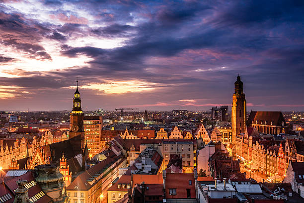 Illuminated city skyline at night Skyline of Wroclaw Central Europe city. Popular travel destination squares. Landmarks historical medieval buildings and churches. Beautiful town illumination. wroclaw stock pictures, royalty-free photos & images