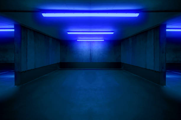 illuminated parking lot / underground car parking spot - illuminated parking lot / underground car parking spot bomb shelter stock pictures, royalty-free photos & images