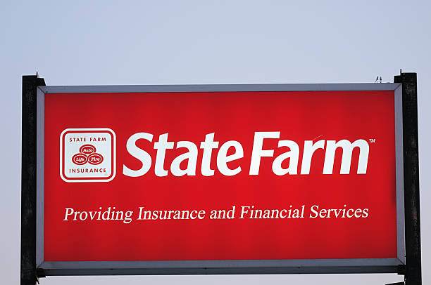 Illuminated State Farm Insurance sign with copy space stock photo