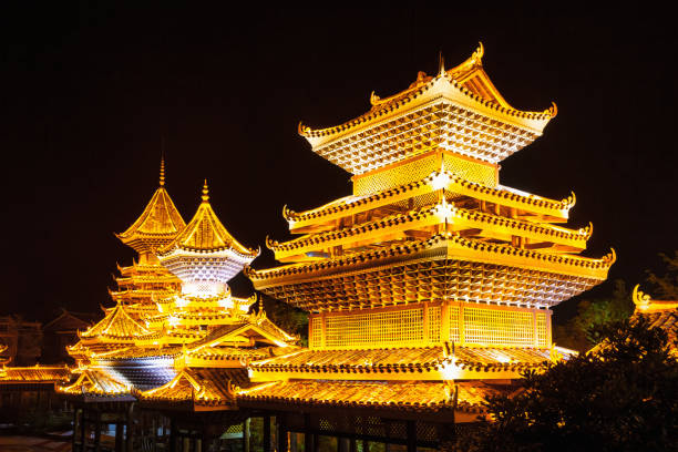 Illuminated Zhaoxing Dong Minority Village Pagoda at Night Shaoxing China stock photo