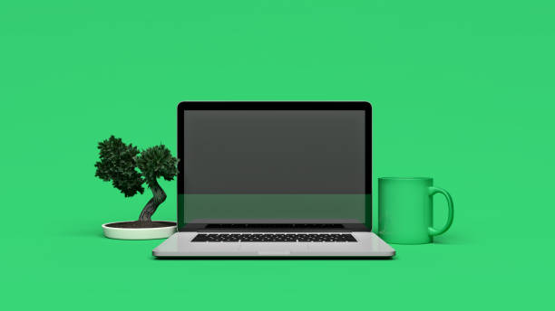 3D illustration mockup of a laptop computer on a bold green minimal background with bonsai tree and cup of coffee with clipping path for easy screen replacement stock photo