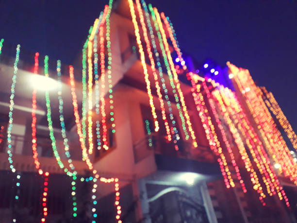 Stock photo of house decorated with multicolour fairy lights for Indian traditional festival of lights, Diwali like Christmas.