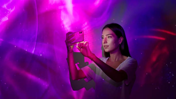 Image projection on a woman using a smart phone stock photo