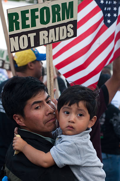 Immigrant Families on the March stock photo