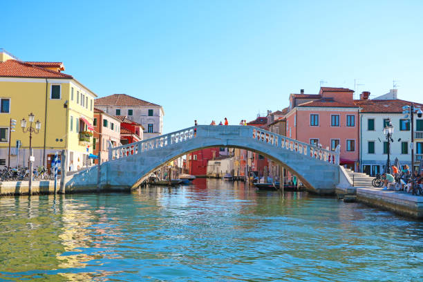 In front of the Vigo Bridge, at the end of Canal Vena, in Chioggia old town (Veneto, Italy) stock photo