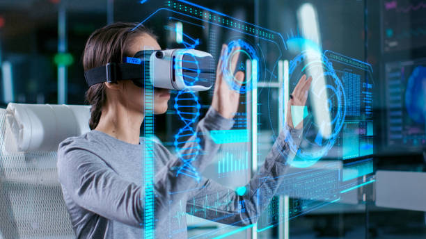 in laboratory scientist wearing virtual reality headset sitting in a chair interacts with futuristic holografic interface, showing neurological data. modern brain study/ neurological research center. - vr glasses imagens e fotografias de stock