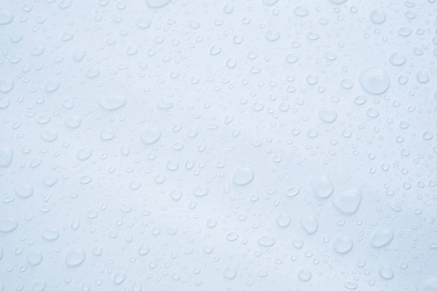 In selective focus droplets on white surface stock photo