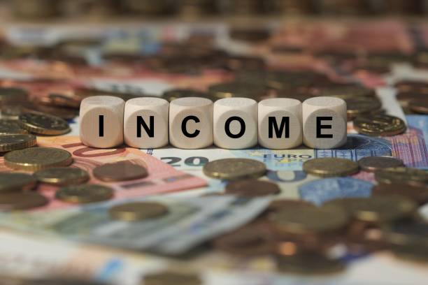income - cube with letters, money sector terms - sign with wooden cubes cubes with letters - sign with wooden cubes - money sector terms gross income stock pictures, royalty-free photos & images
