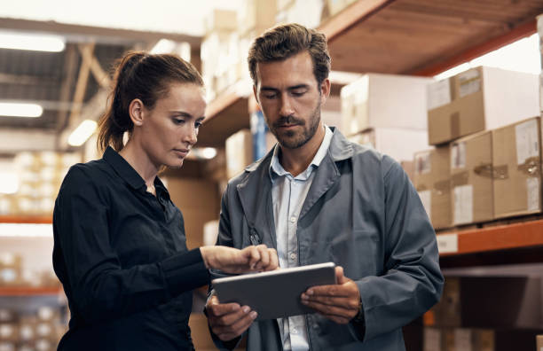 Incorporating IT systems into warehouse management stock photo